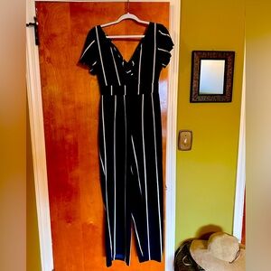 Navy blue and white striped jumpsuit.